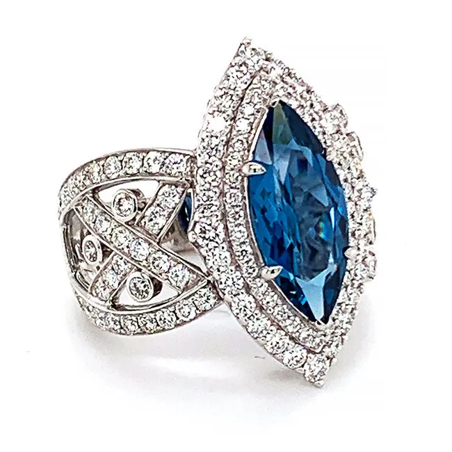 Platinum engagement ring with Marque Rare Blue Zircon and diamonds