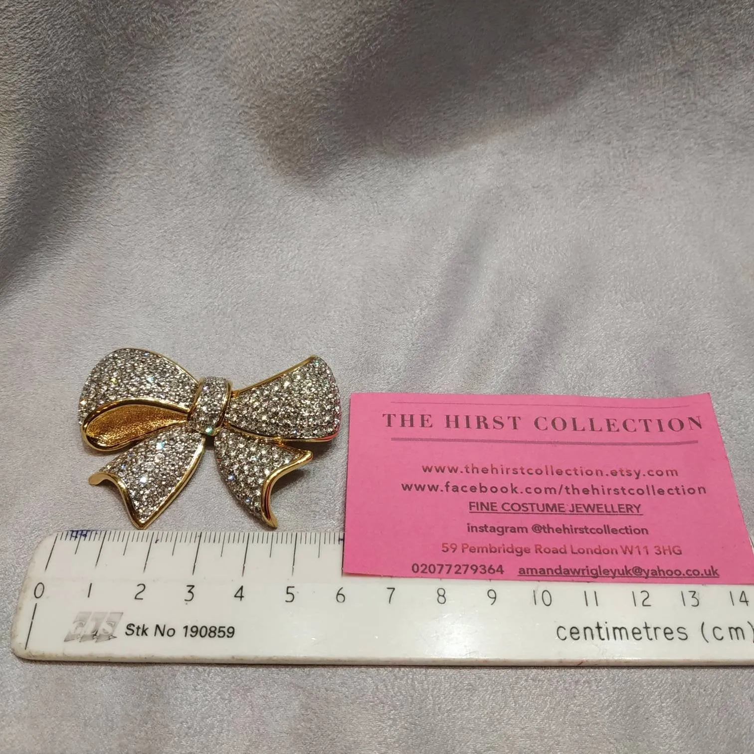 Vintage Swarovski bow brooch crystal gold plated