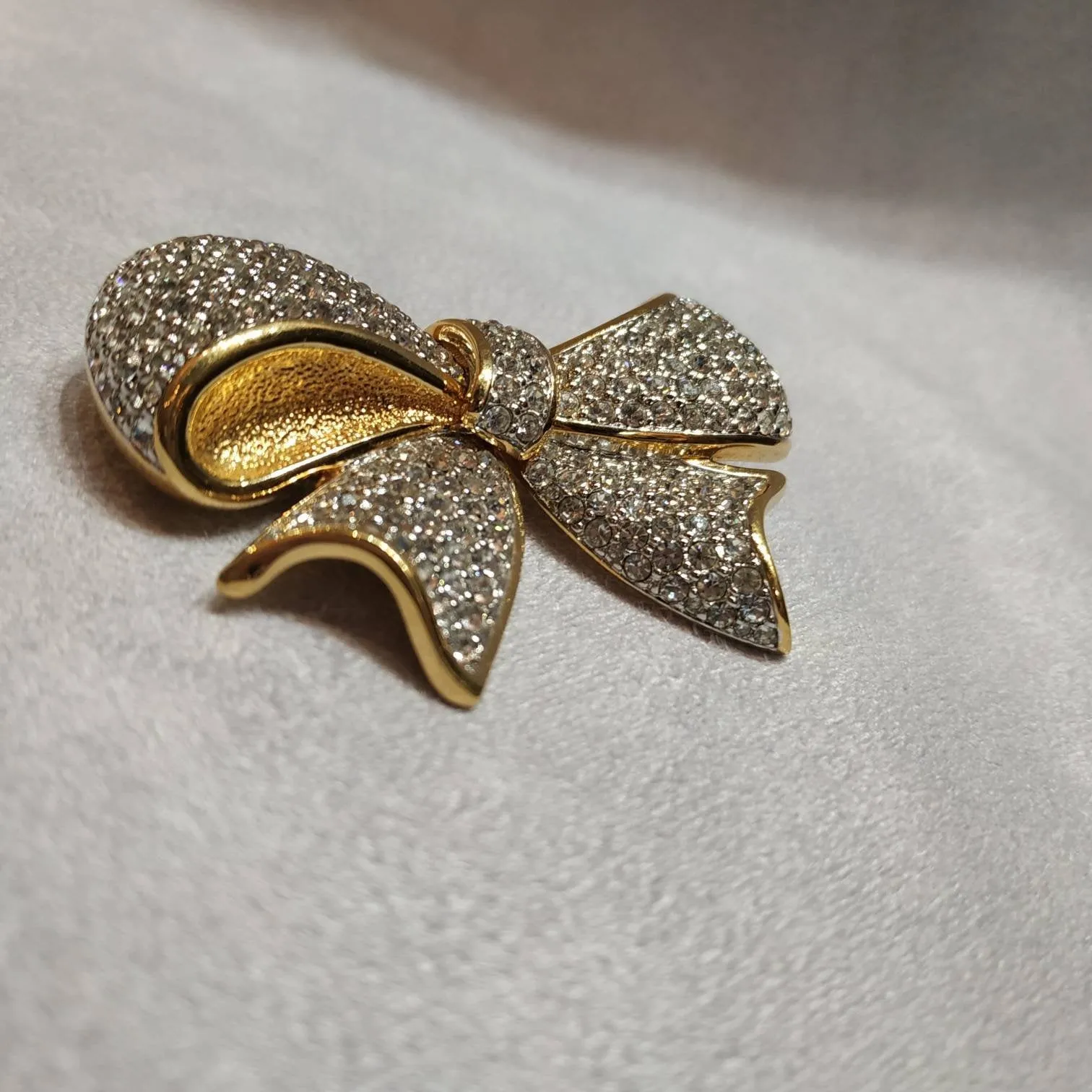 Vintage Swarovski bow brooch crystal gold plated